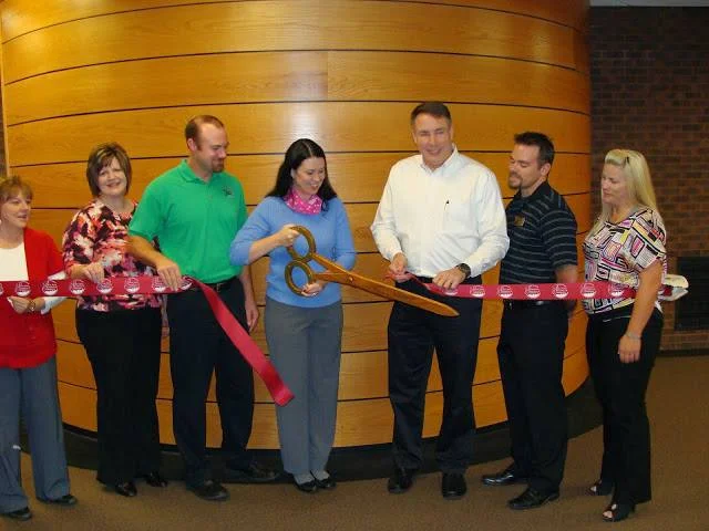 go 2 girl ribbon cutting 2.jpg